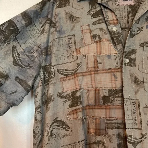 Upcycled patched over dyed fringe back sportsmen’s fish print plaid duster shirt